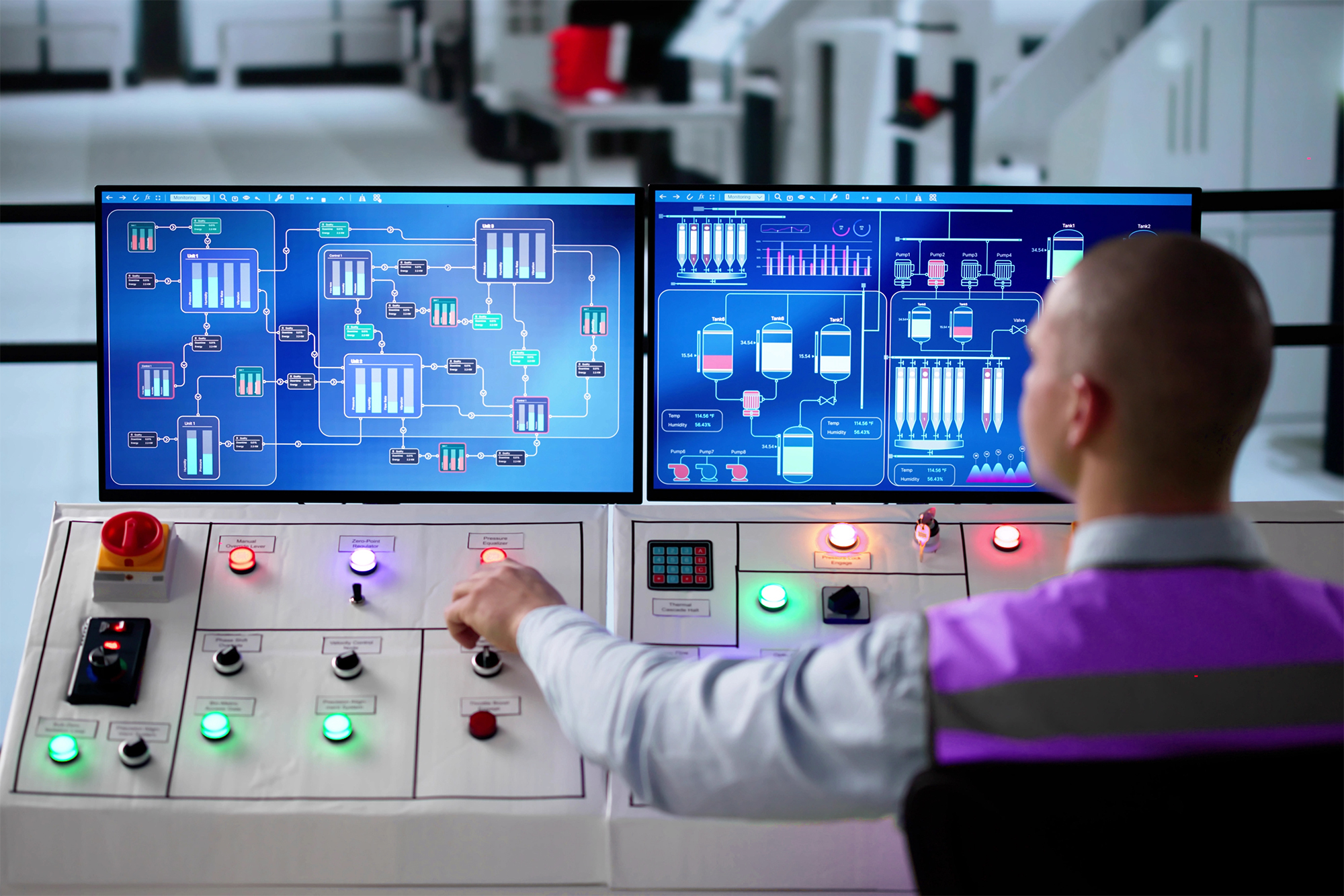 operator review manufacturing production information displayed on a control panel