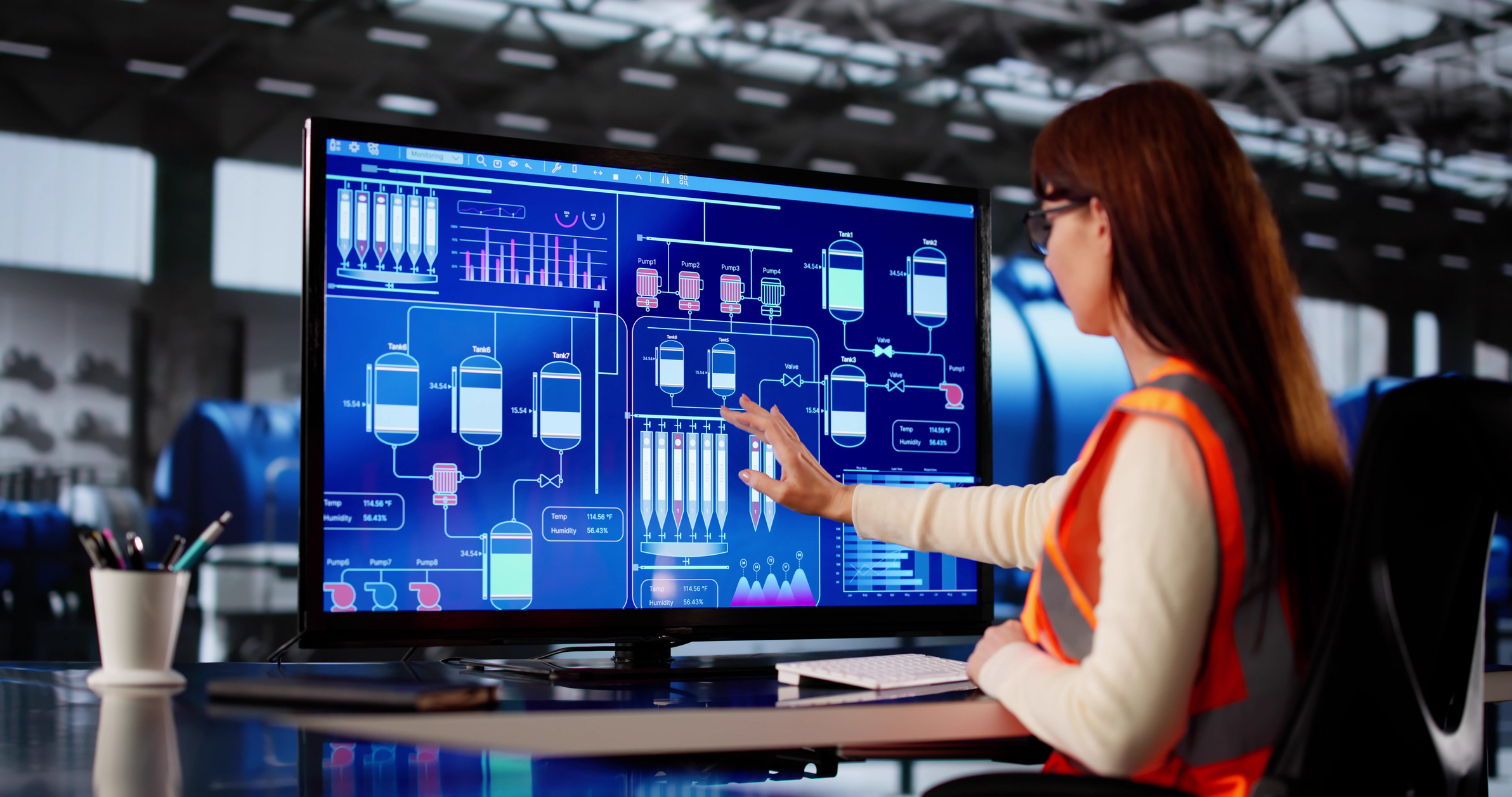 industrial automation control system panels and network infrastructure representing PLC, DCS, and SCADA architecture in a manufacturing environment